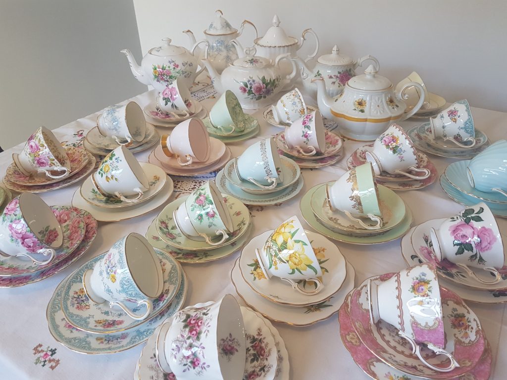 Multi coloured teapots and teacups to hire for high teas and special events