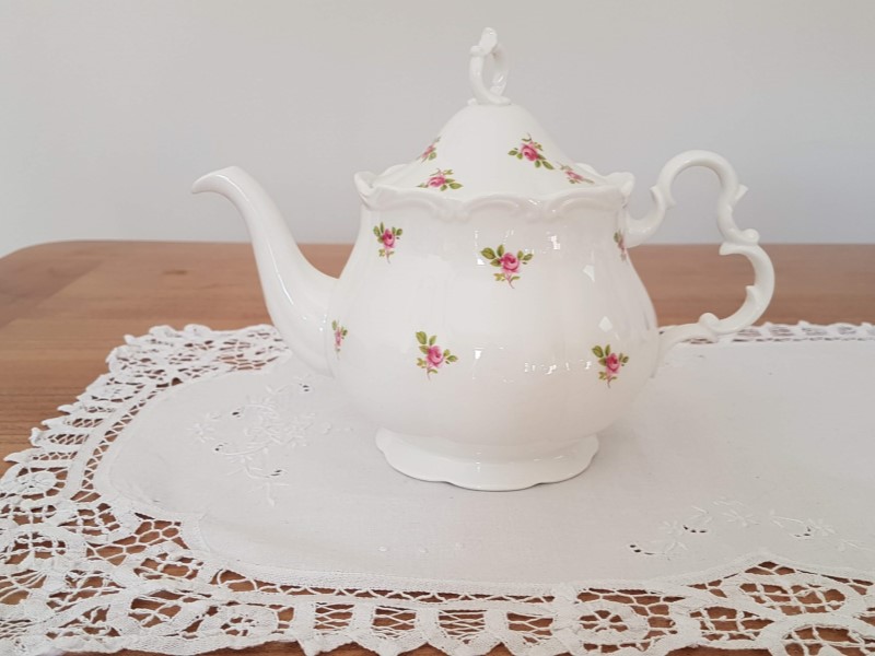 White china teapot with tiny roses to hire from the Vintage Teacup Queen for high tea
