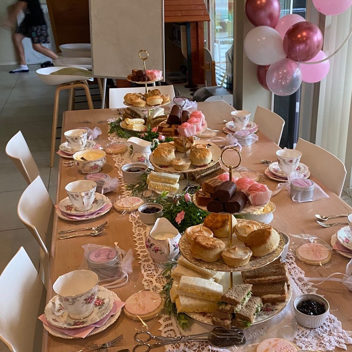 High tea table with vintage china for baby shower