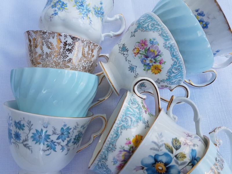 A Tangle of blue vintage china teacups to hire for high tea